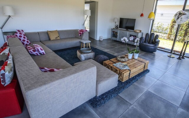 Magnificent waterfront design villa, located near Harderbos