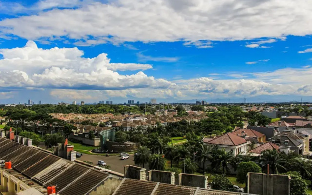 Relaxing 2BR Apartment at M-Town Residence By Travelio
