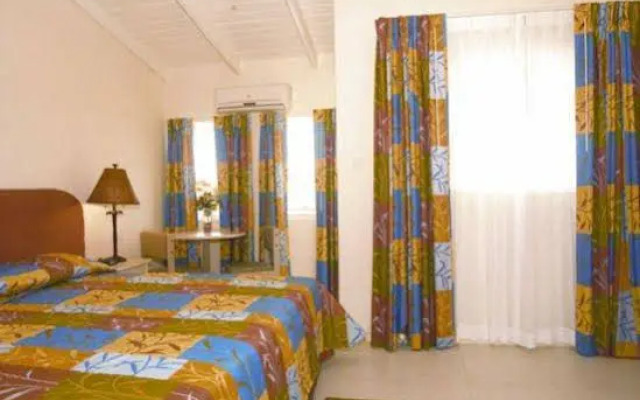 Tropical Winds Apartment Hotel