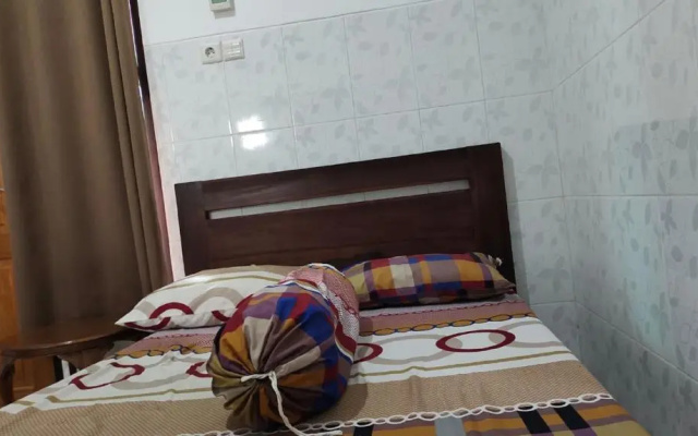 OYO 91233 Bismo 85 Family Syariah