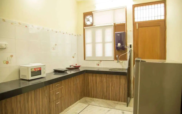 Urvi Apartments by OYO Rooms