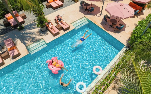 Signature By M Village Beachfront Hotel
