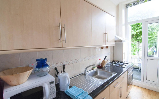 Queen's Club Apartments