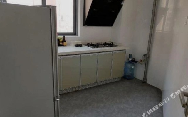 Qingqing Wojia Hotel Style Apartment