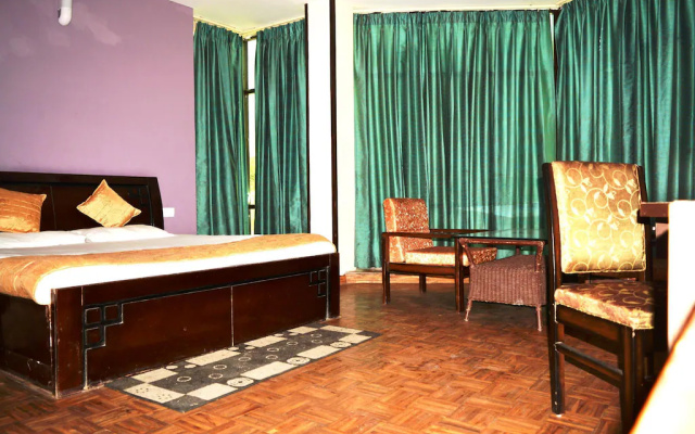 Fabhotel Burans Residency