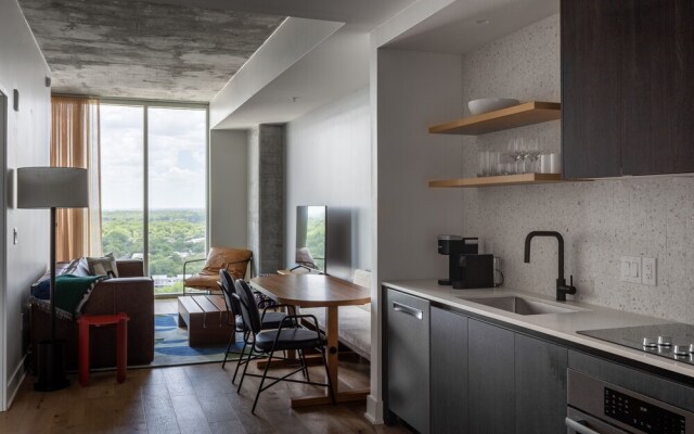 20th floor condo with pool on Rainey St by Locale