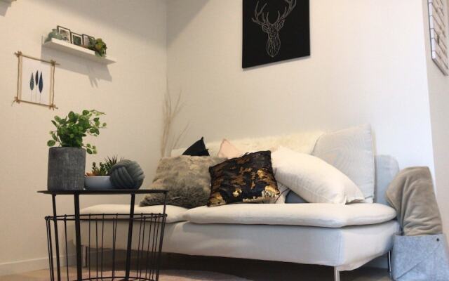 Cozy Apartment with Riverside Views