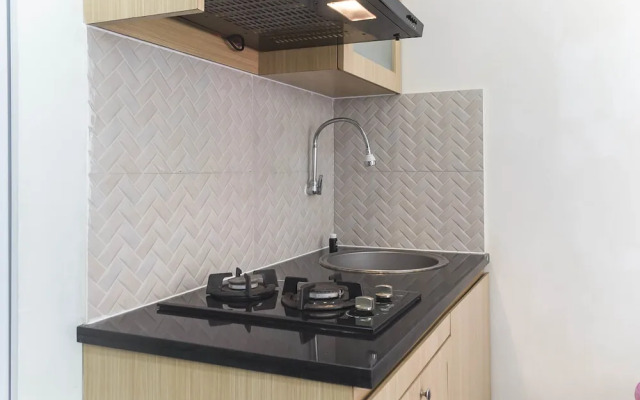 Homey and Comfy 2BR at Green Pramuka City Apartment