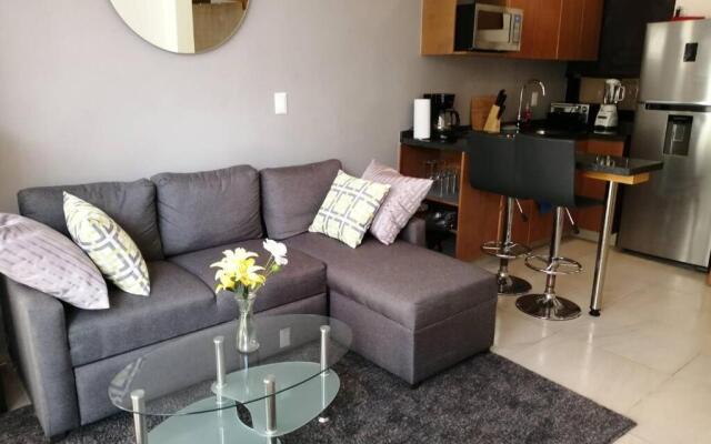 Modern 1 bedroom suite by beach Great location!