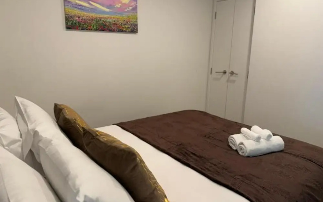 Near Sky Tower Cozy 1B Apt Close to Port – Guest Rooms – Auckland