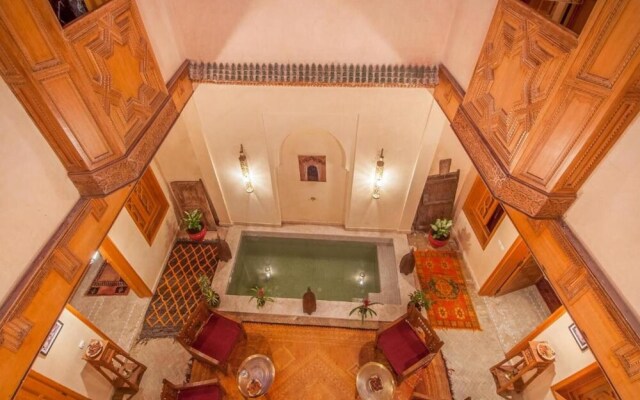 "room in Guest Room - Riad Lakouas Triple Room With Pool View"