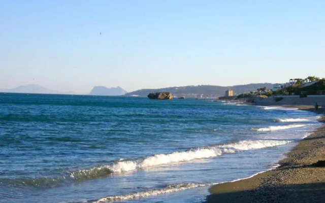 Precioso apartamento con jardín y piscina comunitaria