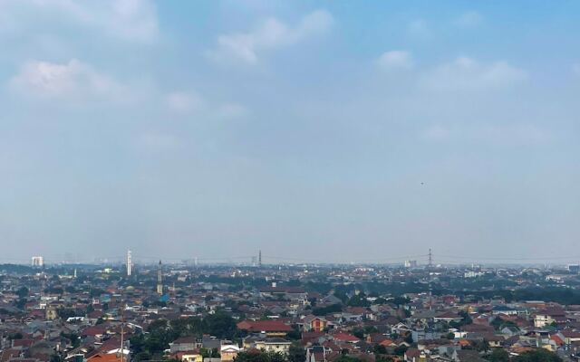 Restful 2Br Bassura City Apartment Near Shopping Mall