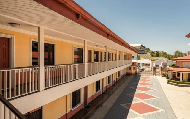 Prado Inn & Suites