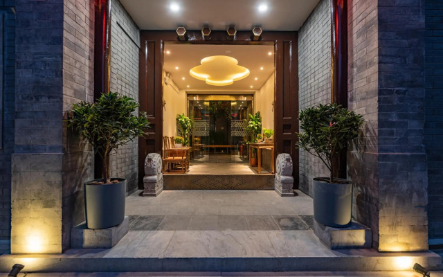 Qiuguo Hutong Courtyard Hotel