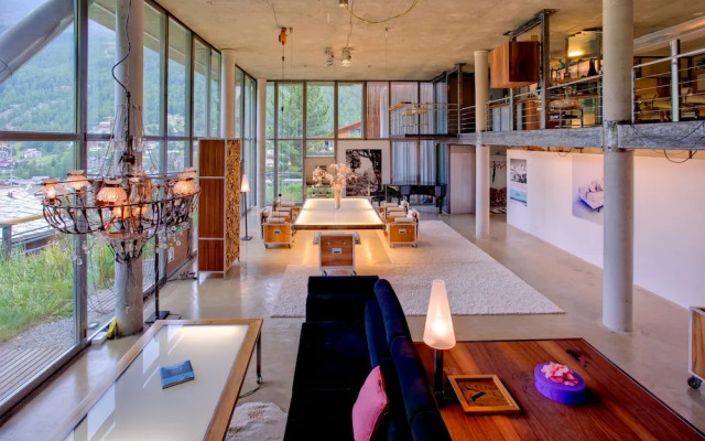Mountain Exposure Luxury Chalets & Penthouses & Apartments