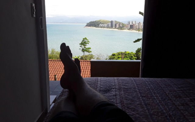 Honey Moon - Vista do mar na cama.