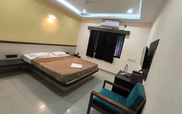 Pbs Grand by OYO Rooms