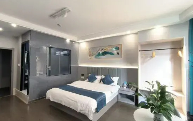 Napo Huapeng Business Hotel