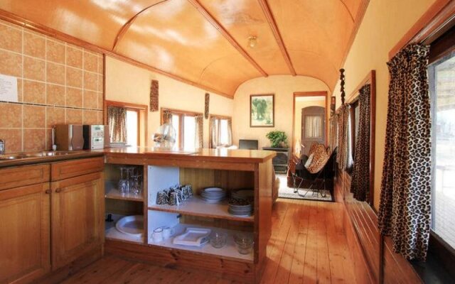 Krinklewood Cottage and Train Carriages