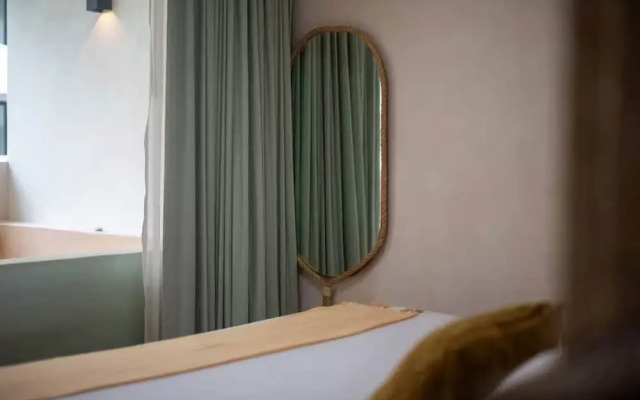 Guest INN Home - Elements Suites