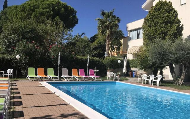 Snug holiday home in Loano with shared pool