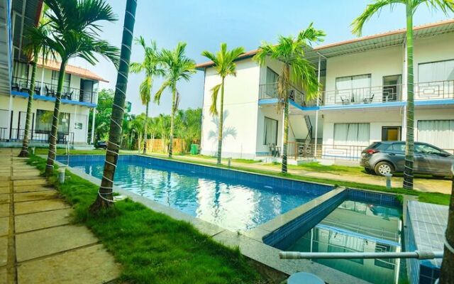 Fabhotel Morjim Bliss