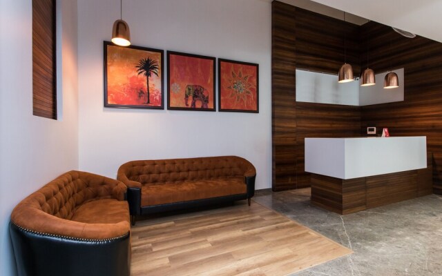 Capital O 16115 Hotel Solitaire