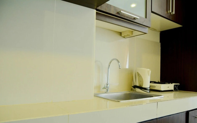 Simply Studio Room Atria Residence Apartment near Summarecon Mall By Travelio