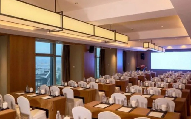 Maison New Century Hotel