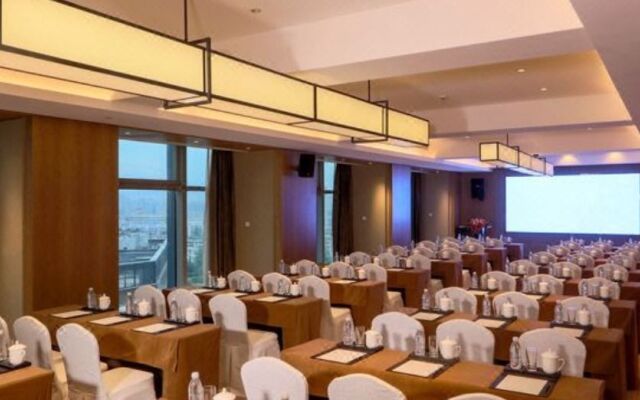 Maison New Century Hotel