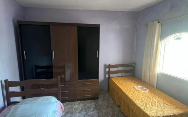 Casa com wi-fi e garagem a 5 minutos da Praia Grande