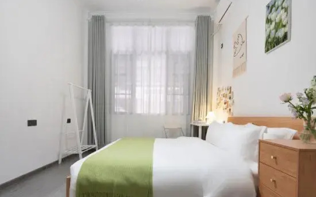Sanchen XiaoyangBuilding Homestay