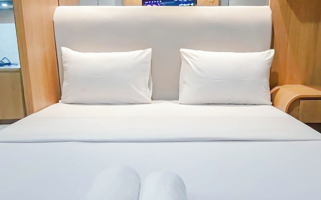 Wooden Touch Studio At Tamansari Skylounge Makassar Apartment