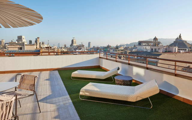 Отель NH Collection Barcelona Gran Calderón