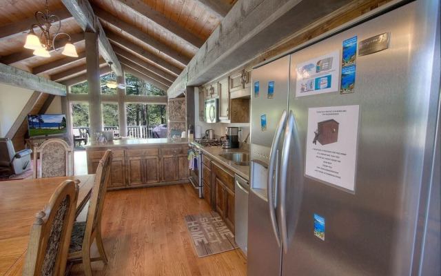 Remodeled Gambrel Style Home with Trees Views by RedAwning