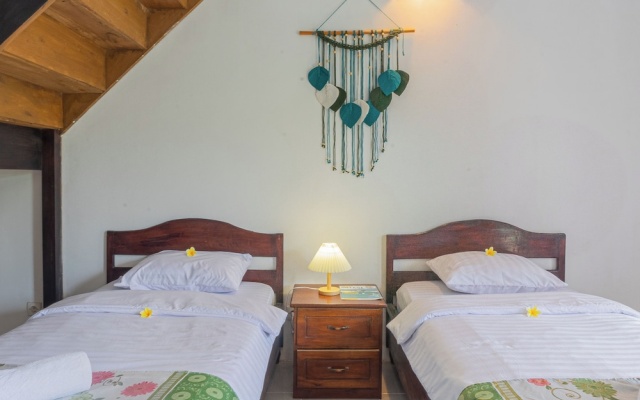 Green orry inn cafe & cottages – Guest Rooms – Tetebatu