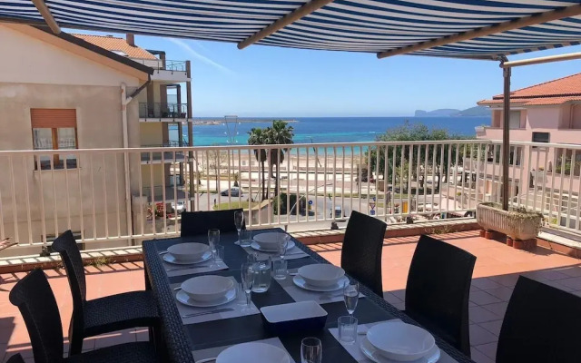 Alghero, Lighthouse Penthouse with sea view and beach front
