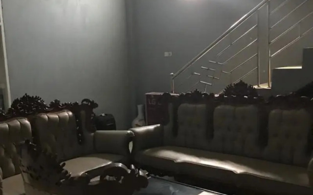 The Carstensz Homestay by ZUZU