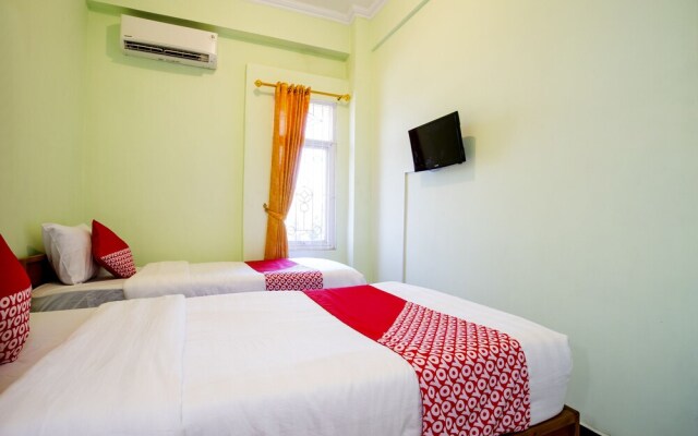 Rhona Guest House Syariah by OYO Rooms