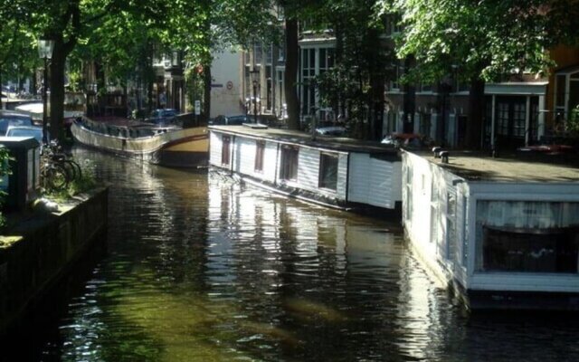 Houseboat in Amsterdam Old Center