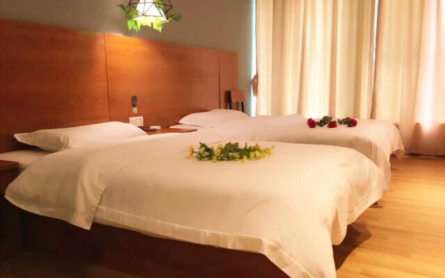 Yimi Hotel Baogang Dadao Station Branch