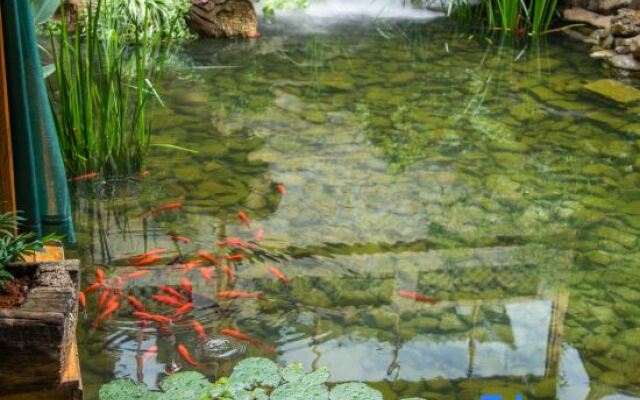 Puzhehei Yidu Homestay (Hehua Daguan Garden)