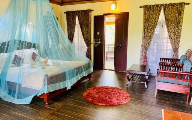 Maadathil Cottages