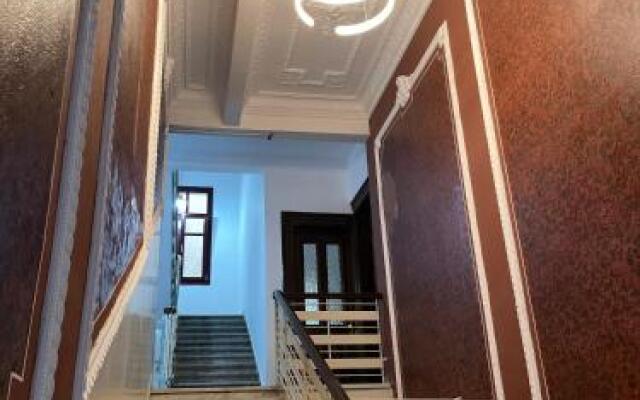 Maroon Bottle Boutique Suites
