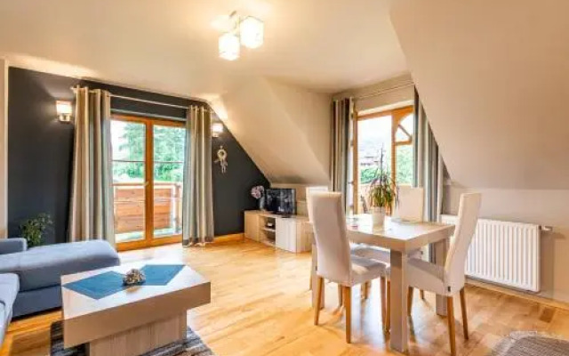 Domek za Strugiem - pokoje i apartamenty