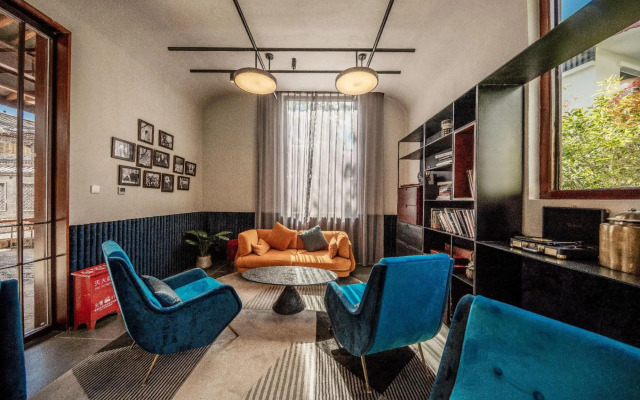 Mengdiezhuang Hotel - Lijiang