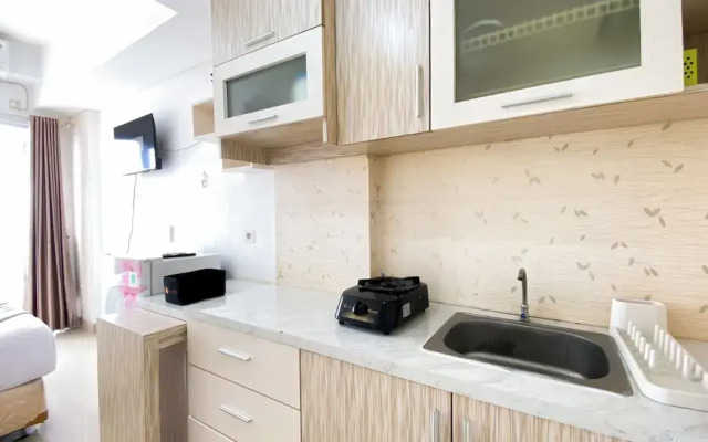 Homey And Cozy Living Studio At Poris 88 Apartment