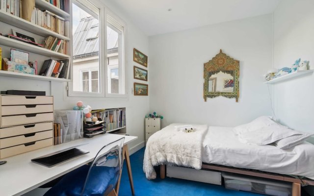 Stylish Vintage 3BR Apartment in Le Marais by GuestReady