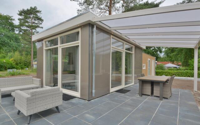 Comfy Chalet With Sunshower, Located in a Forrest